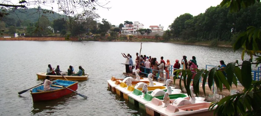 Tourists enjoying pedal boating ride at Yelagiri lake.