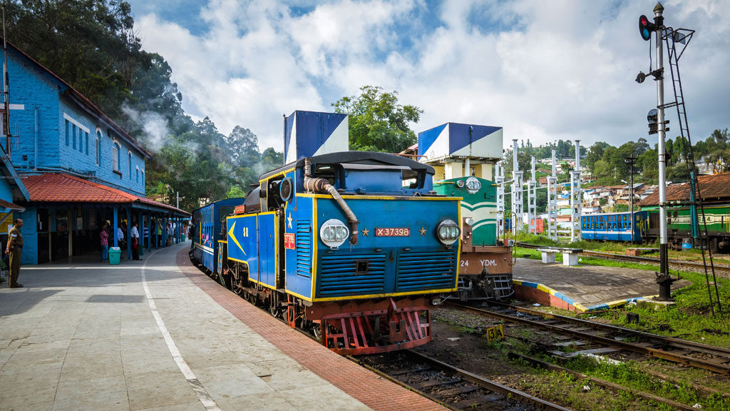 A beautiful view of Blue heritage steam engine train of "Nilgiri mountain railway" at the Coonoor station, Tamilnadu.