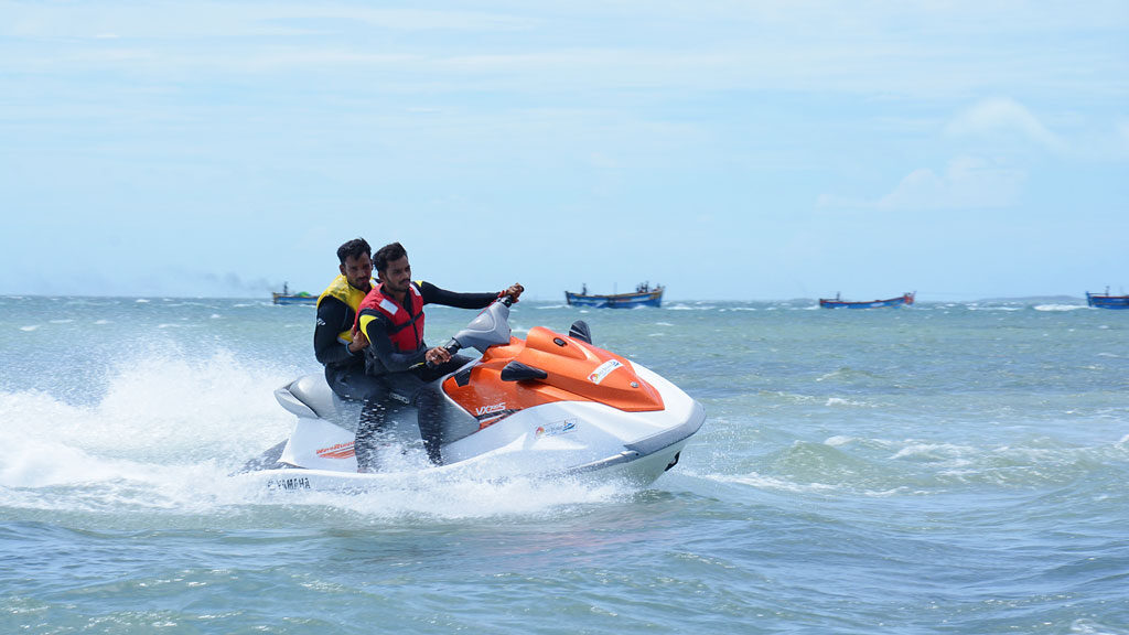 Young adventure enthusiasts enjoying Jet skiing in the beaches of Rameswaram.